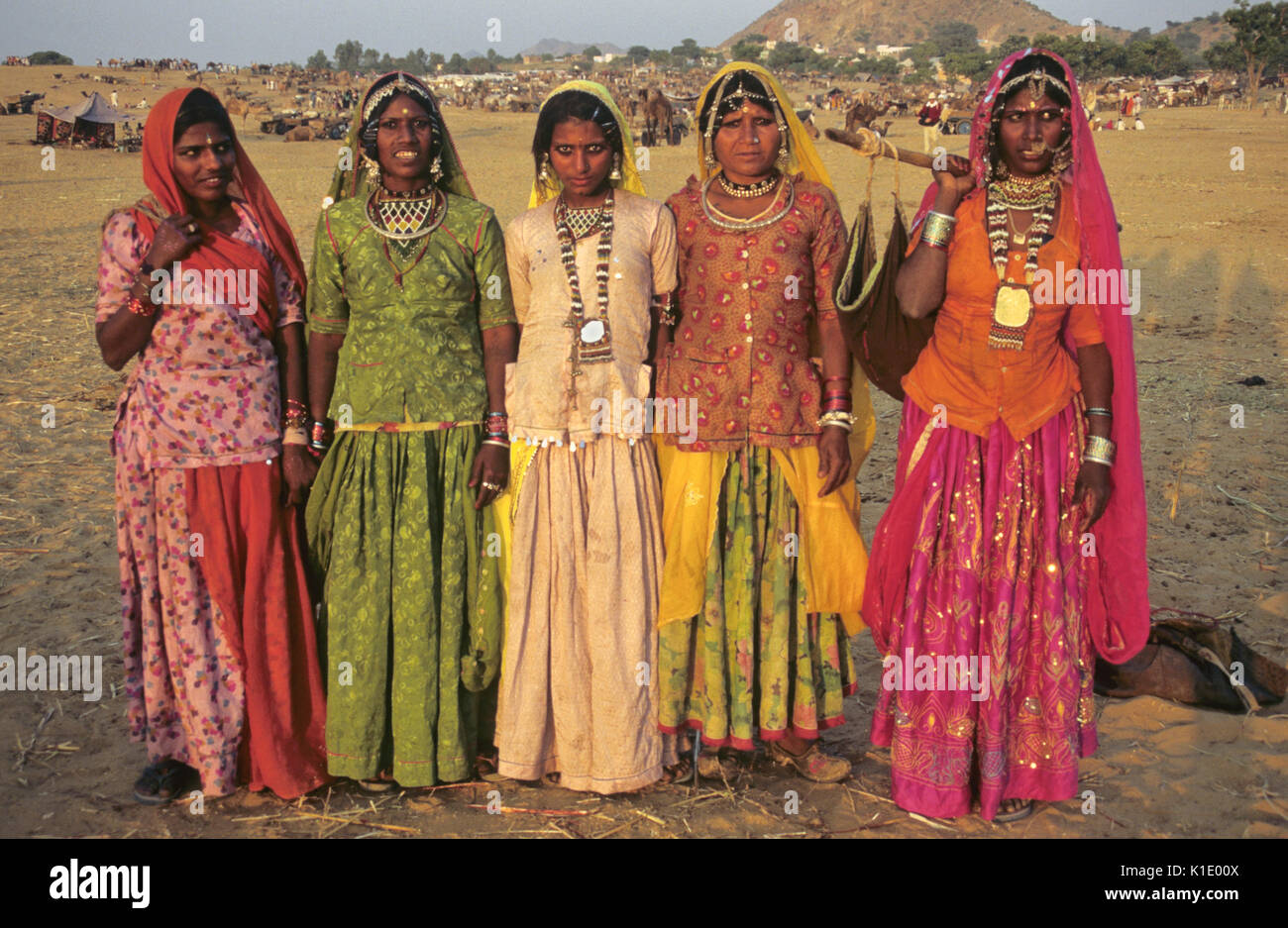 Rajasthani women in festival dress, Pushkar Camel & Cattle Fair, Pushkar, Rajasthan, India Stock Photo