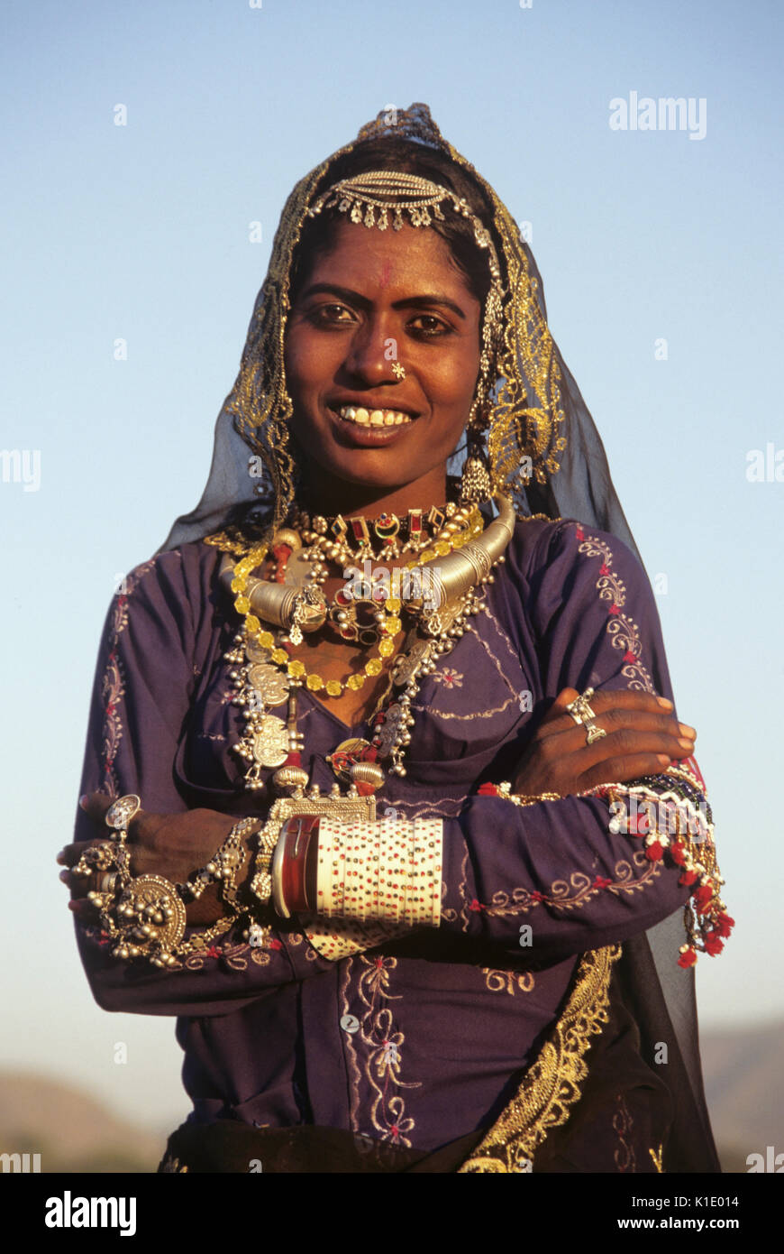 Rajasthani woman in festival dress, Pushkar Camel & Cattle Fair, Rajasthan, India Stock Photo