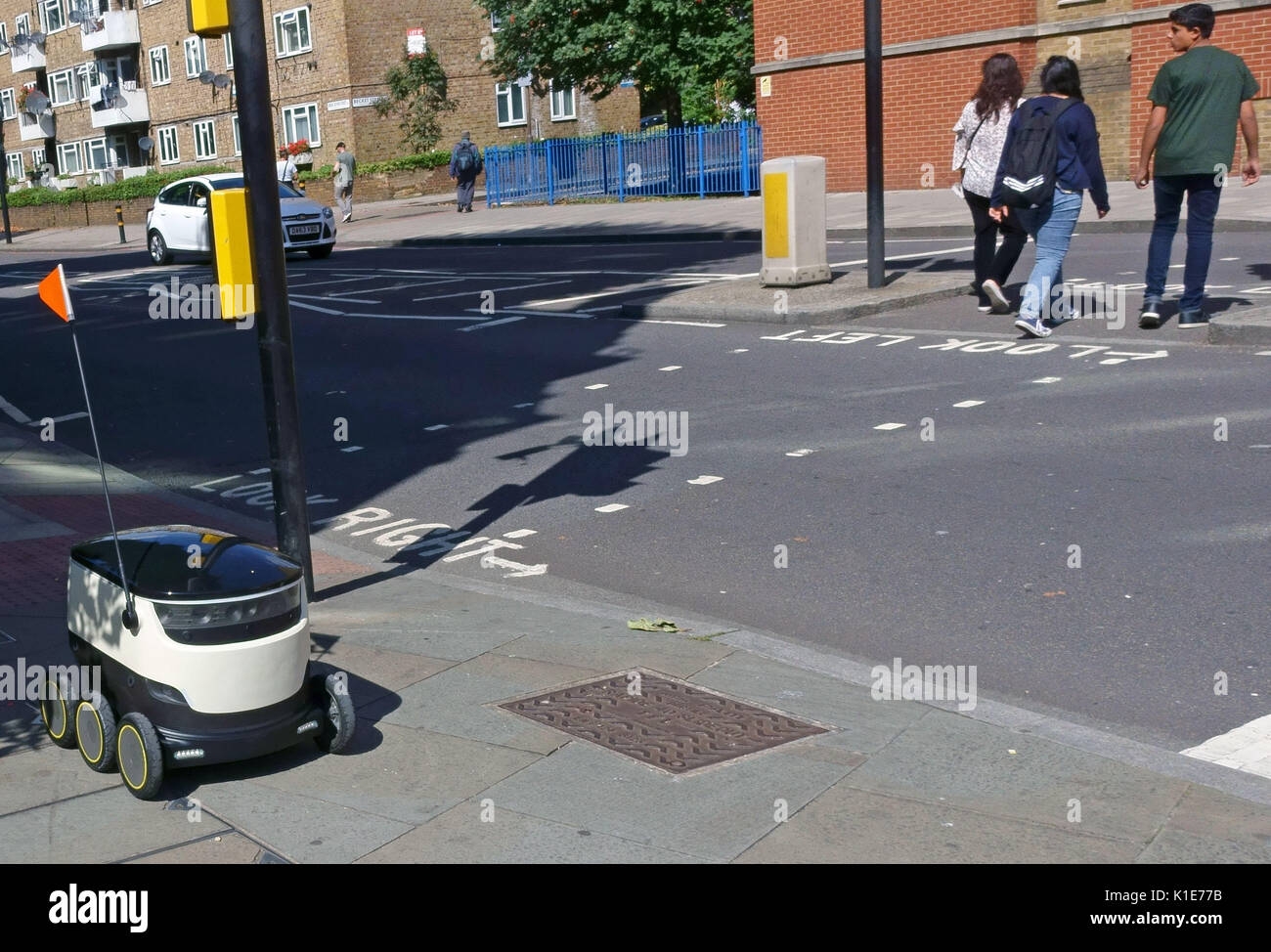 Borough, London, UK. 25th Aug, 2017. Food delivery robots made by Starship Technologies have gone on trial in London. The six-wheeled autonmous vehicles are being prepared to undertake take-out home deliveries for two major food outlets. At present they are accompanied by human handlers. Please credit pictures by (C) Credit: Jeffrey Blackler/Alamy Live News Stock Photo