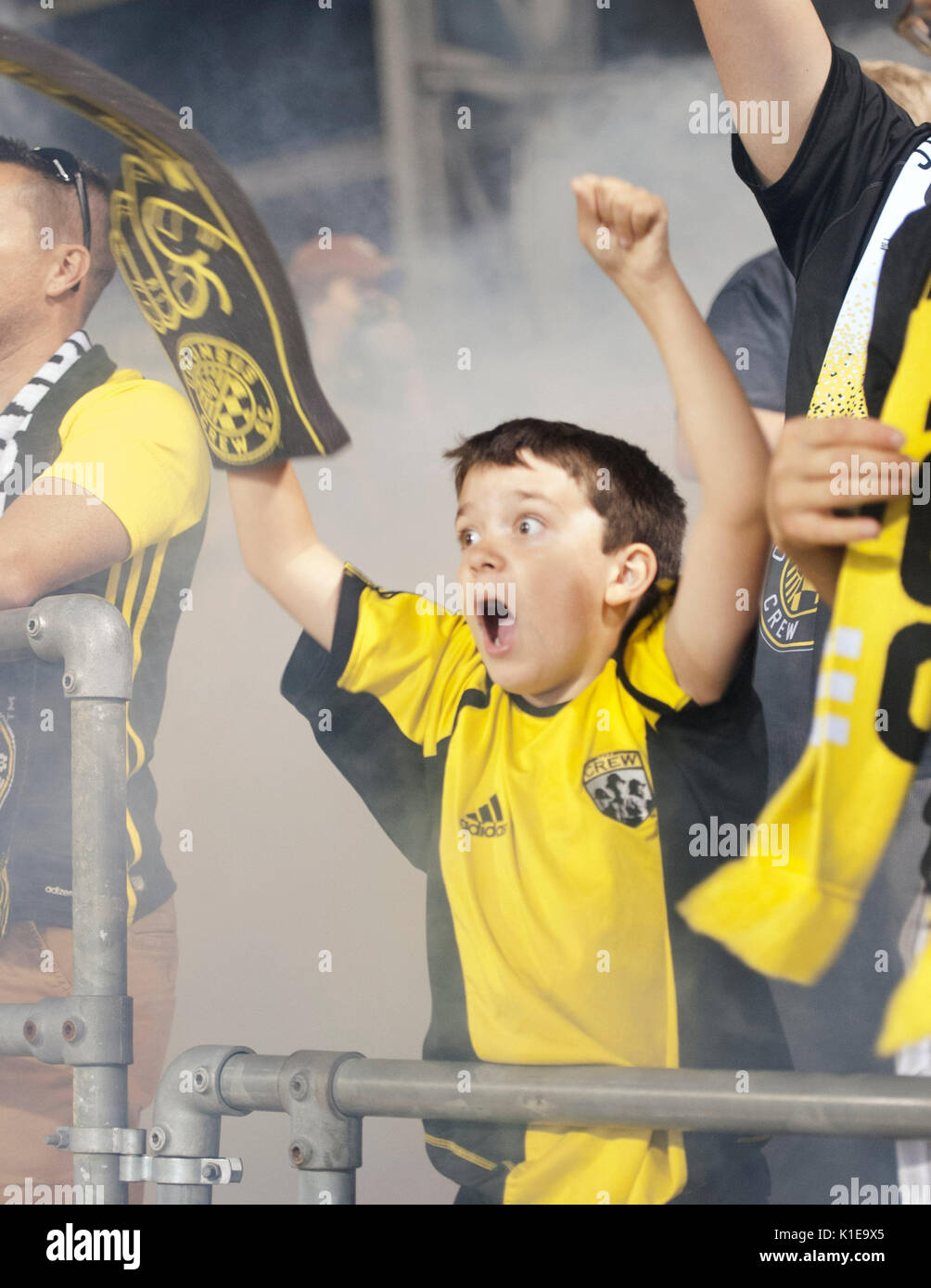 Columbus, U.S.A. 26th Aug, 2017. August 26, 2017: A young Columbus crew SC fan cheers after Columbus Crew defender Jonathan Mensah (4) makes it 2-0 Columbus against Dallas in their game at Mapfre Stadium. Columbus, Ohio, USA. Credit: Brent Clark/Alamy Live News Stock Photo