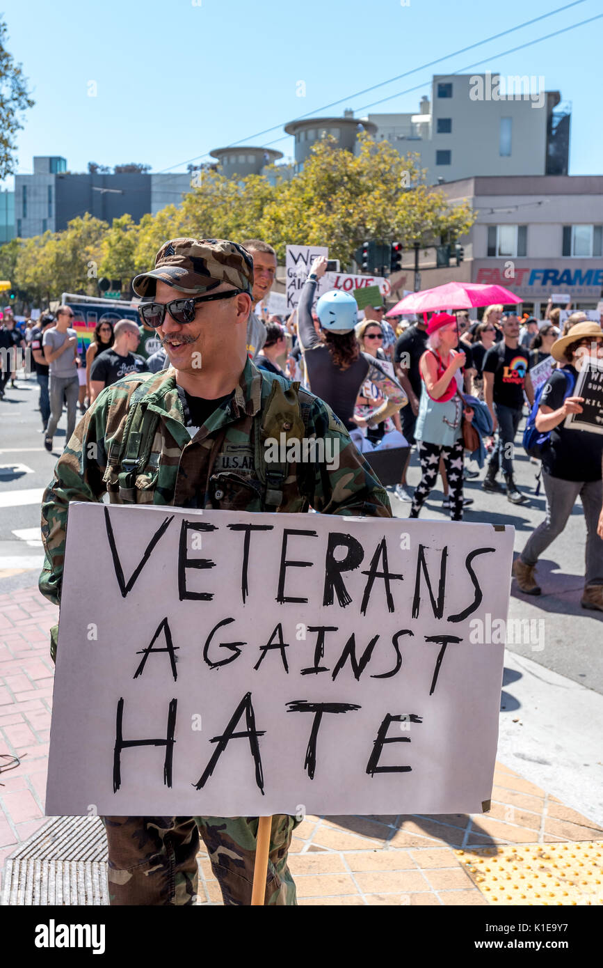 San Francisco, USA. 26th August, 2017, the No Hate rally and protest march in San Francisco. A veteran protester with sign. The group gathered at Harvey Milk Plaza in San Francisco's Castro district for a rally before marching down Market Street to San Francisco City Hall. Originally planned as one of several counter protests to a previously planned demonstration by right wing group 'Patriot Prayer,' the counter protests in San Francisco still saw large turnouts in a show of support though the Patriot Prayer event was canceled the evening prior. Credit: Shelly Rivoli/Alamy Live News Stock Photo