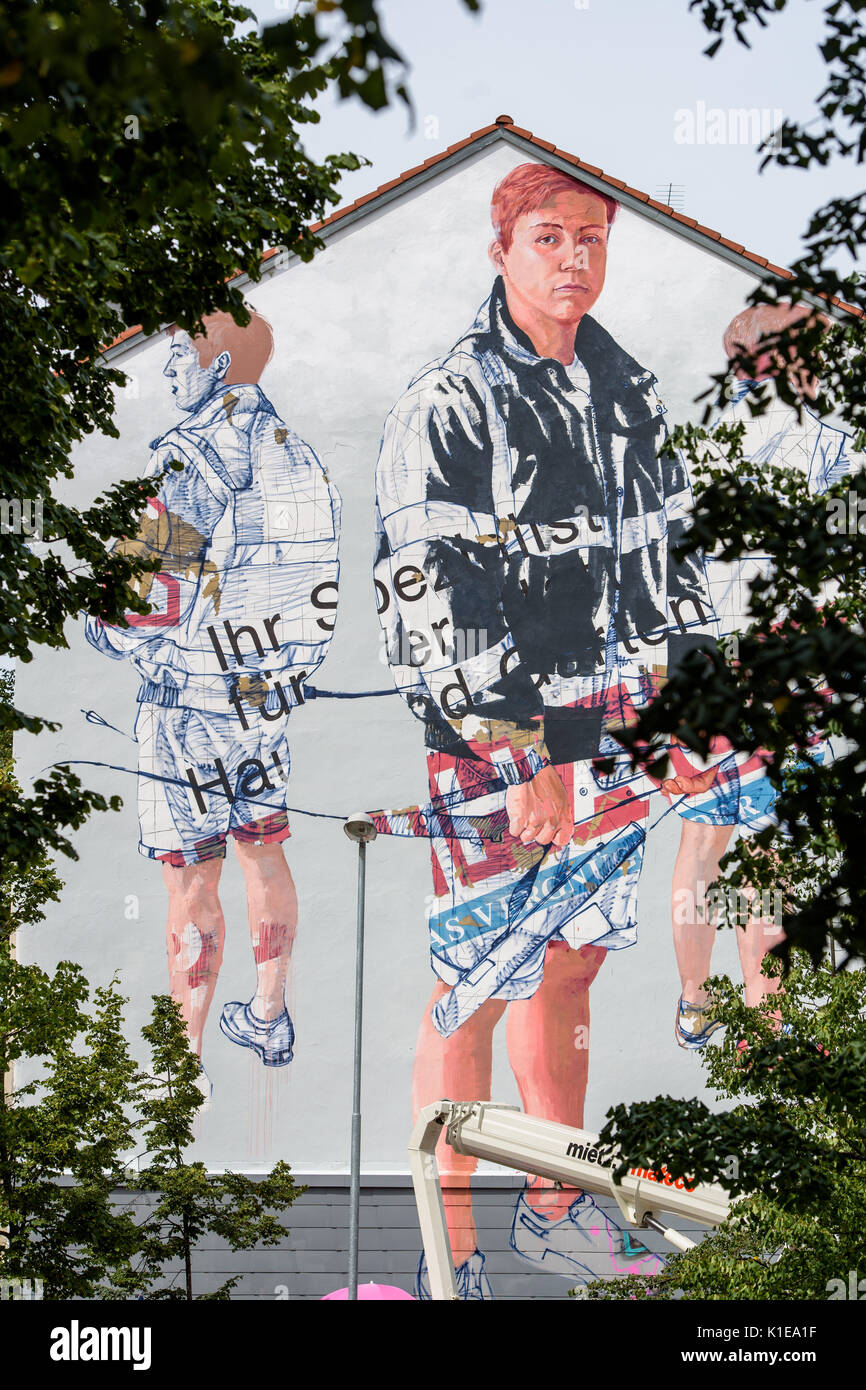 Saabruecken, Germany. 25th Apr, 2017. An art work of the Australian Street Artist Fintan Magee on the exterior of a wall in Saabruecken, Germany, 25 April 2017. It is one of twelve art works which are created for 'Artwalks'. Photo: Oliver Dietze/dpa/Alamy Live News Stock Photo