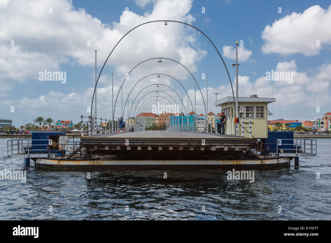 Willemstad, Curacao, Lesser Antilles.  Queen Emma Pontoon Bridge Opening for Ship Traffic to Pass. Stock Photo