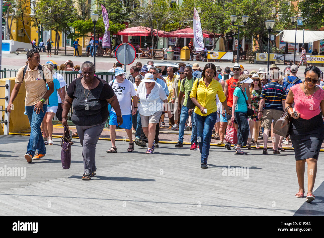 Willemstad, Curacao, Lesser Antilles.  Pedestrians Entering the Queen Emma Bridge Stock Photo