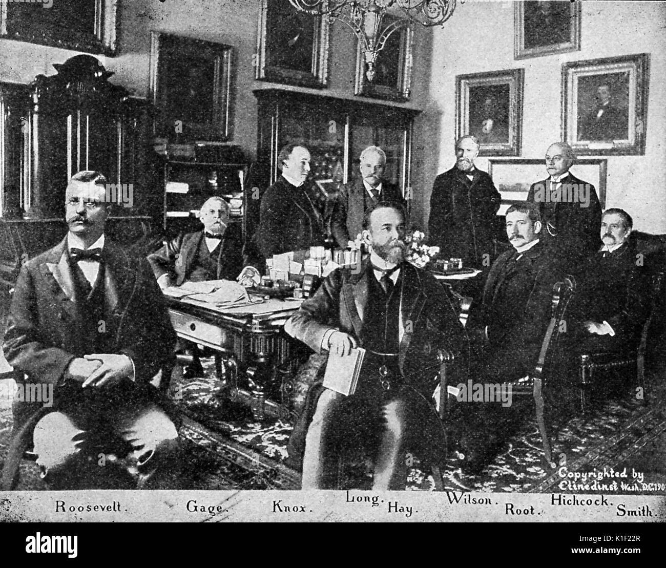 Portrait of President Theodore Roosevelt and his Cabinet, all in an office, some sitting, some standing, their last names listed at the bottom of the picture, Washington, DC, September, 1901. Stock Photo