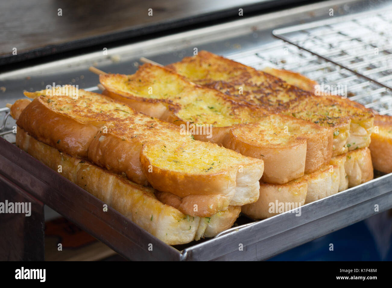A breakfast with grilled bread toast and butter that can see in Chatuchak Weekend market Bangkok