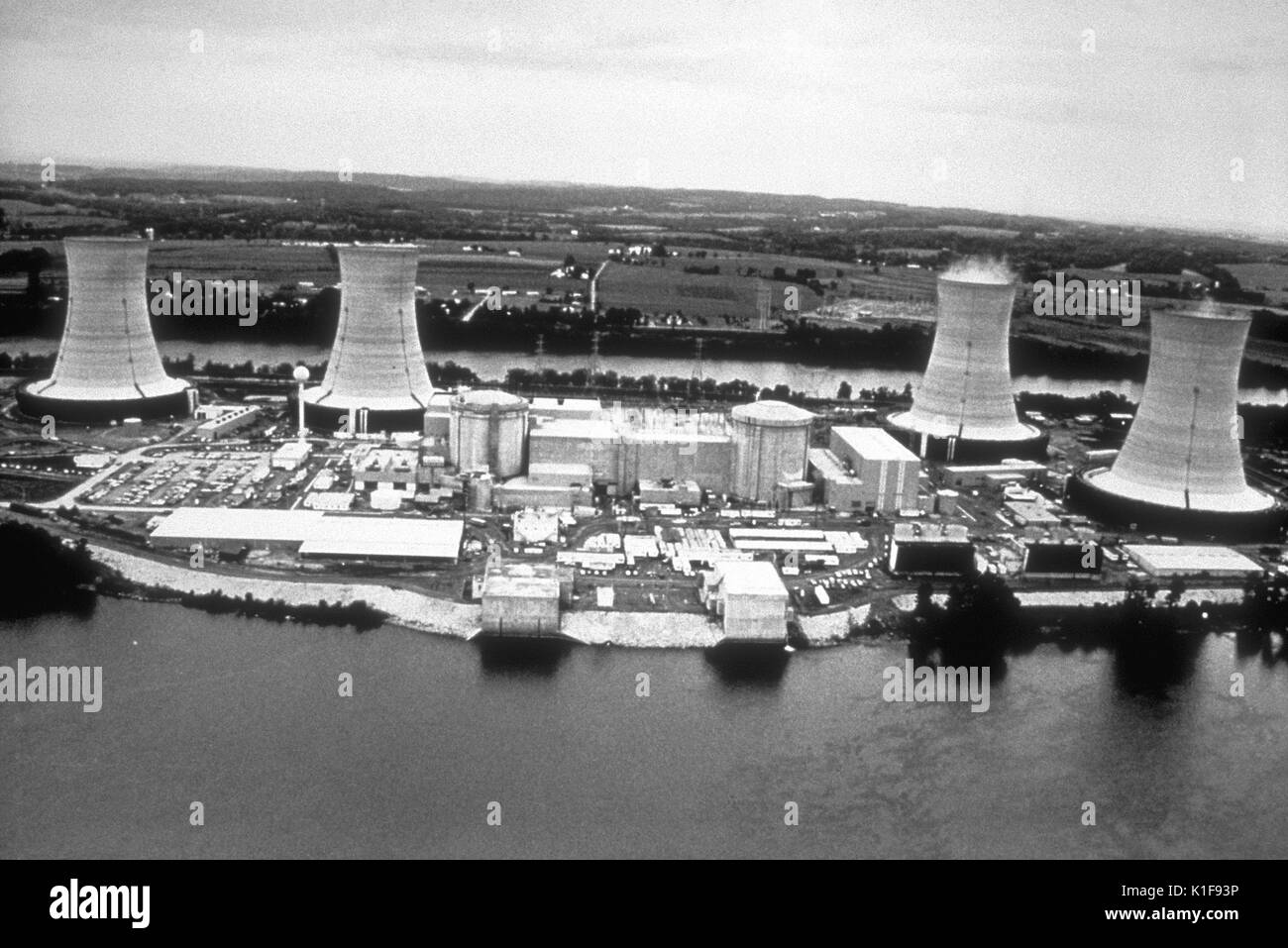 This image depicts the Tree Mile Island nuclear power plant near Middletown, Pennsylvania, which was the site of a March 28, 1979 power plant accident. The accident at the Three Mile Island Unit 2 (TMI-2) nuclear power plant was the most serious in U.S. commercial nuclear power plant operating history, even though it led to no deaths or injuries to plant workers or members of the nearby community. It brought about sweeping changes involving emergency response planning, reactor operator training, human factors engineering, radiation protection, and many other areas of nuclear power plant operat Stock Photo