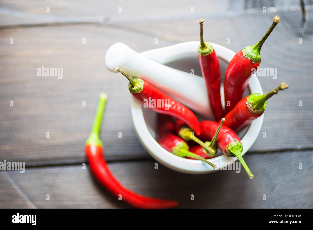 Red hot chilli peppers on dark background with copyspace Stock Photo ...