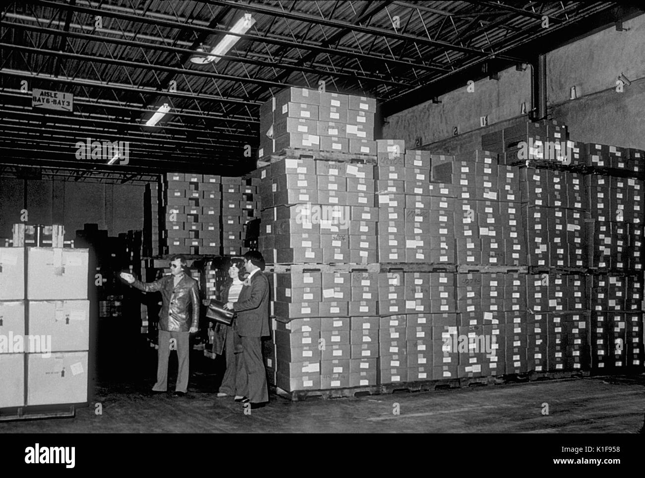 Stored boxes of swine influenza vaccine. IMGSETINF, Stored boxes of swine influenza vaccine. Image courtesy CDC. 1974. Stock Photo