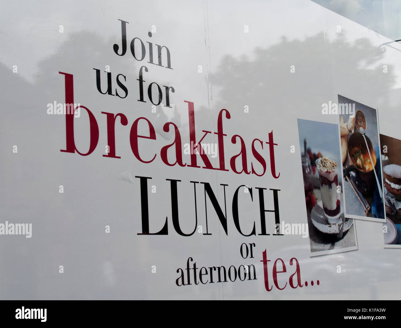 Debenhams Department store joint us for breakfast lunch or afternoon tea sign advertising instore cafe Stock Photo
