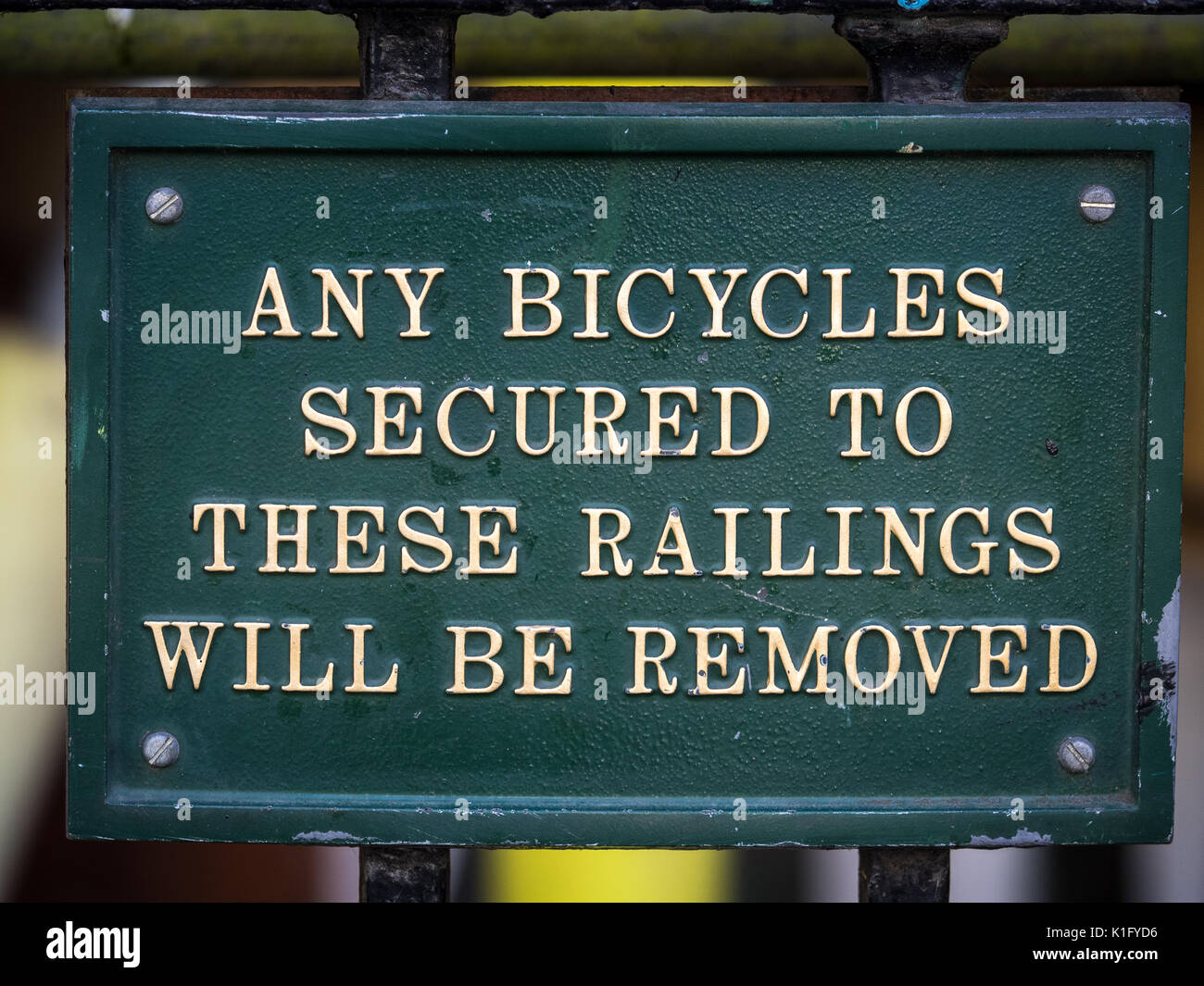 Sign prohibiting locking bikes to the railings Stock Photo