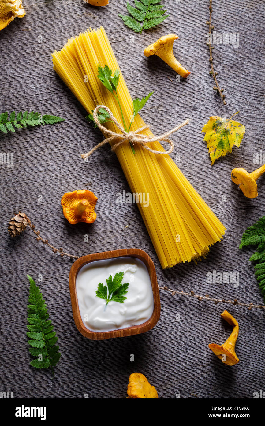 Ingredients for spaghetti with yellow mushroom (chanterelle) fungus