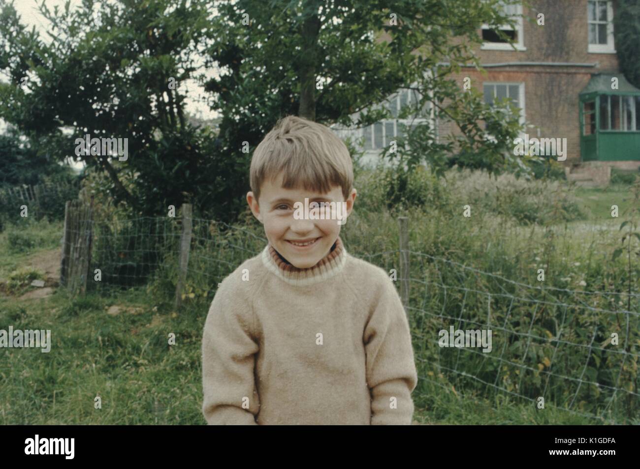 A Half Length Portrait Of A Smiling Boy With Brown Hair Wearing A Stock Photo Alamy A Half Length Portrait Of A Smiling Boy With Brown Hair Wearing A Stock Photo Alamy