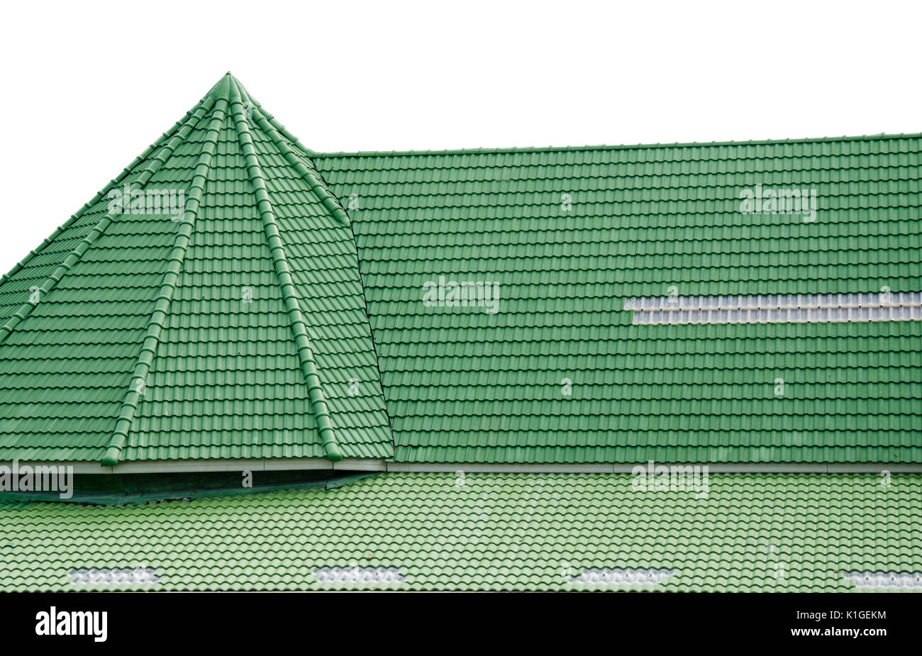 Green tile roof on the white background Stock Photo - Alamy