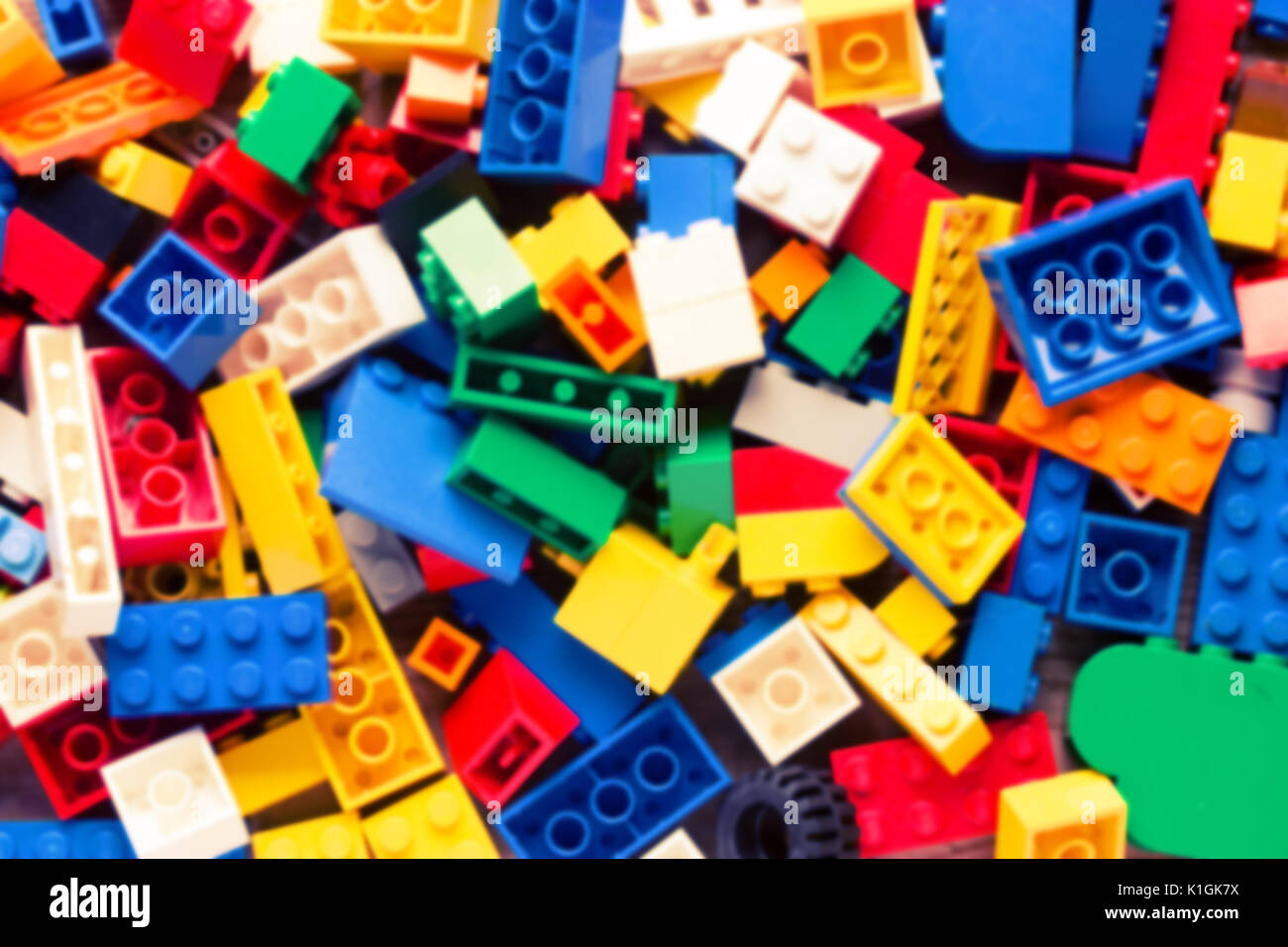 blurred red lego background. many colorful details Stock Photo - Alamy