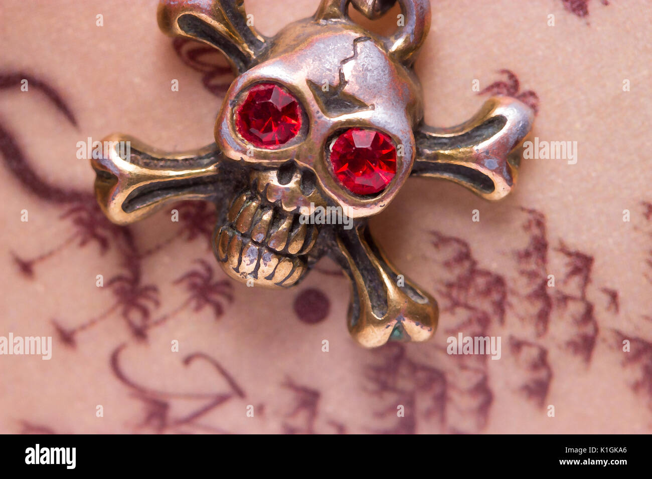close up of metal skull with red eyes. pirate concept Stock Photo