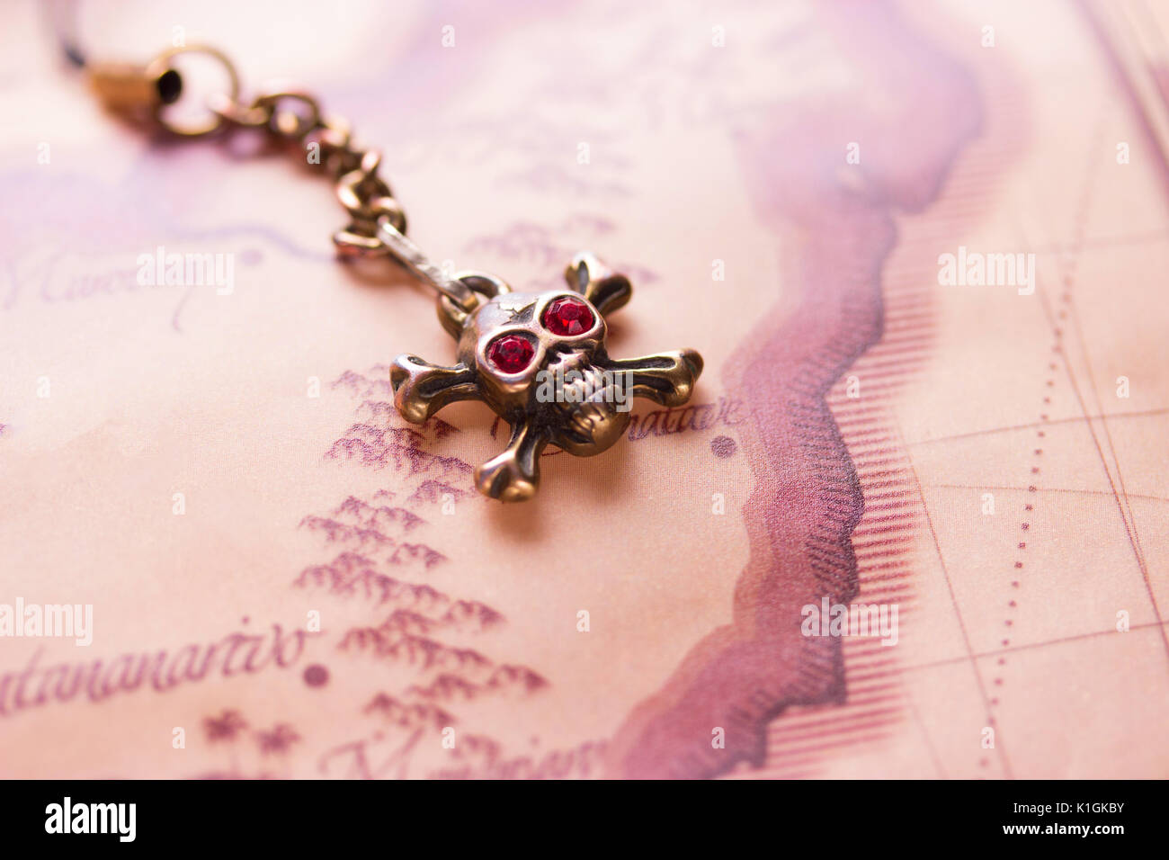 close up of metal skull with red eyes. pirate concept Stock Photo