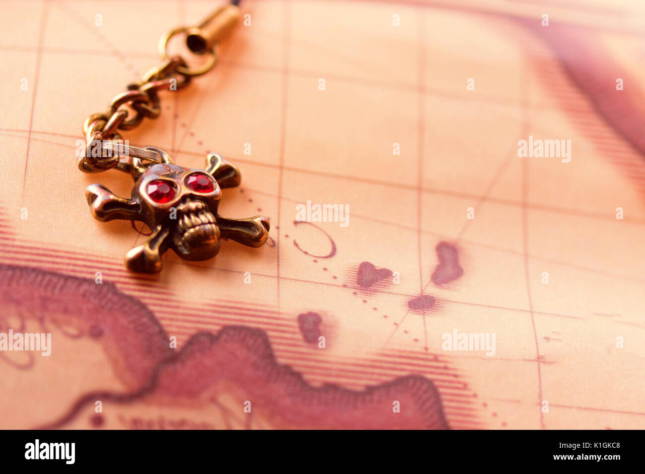 close up of metal skull with red eyes. pirate concept Stock Photo