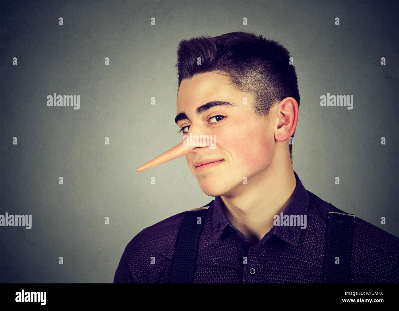 Liar funny looking young man Stock Photo