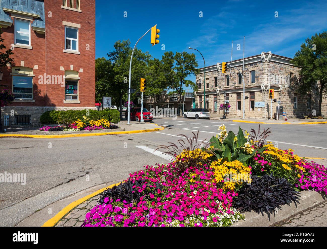 A street with decorative flower beds in Morden, Manitoba, Canada. Stock Photo