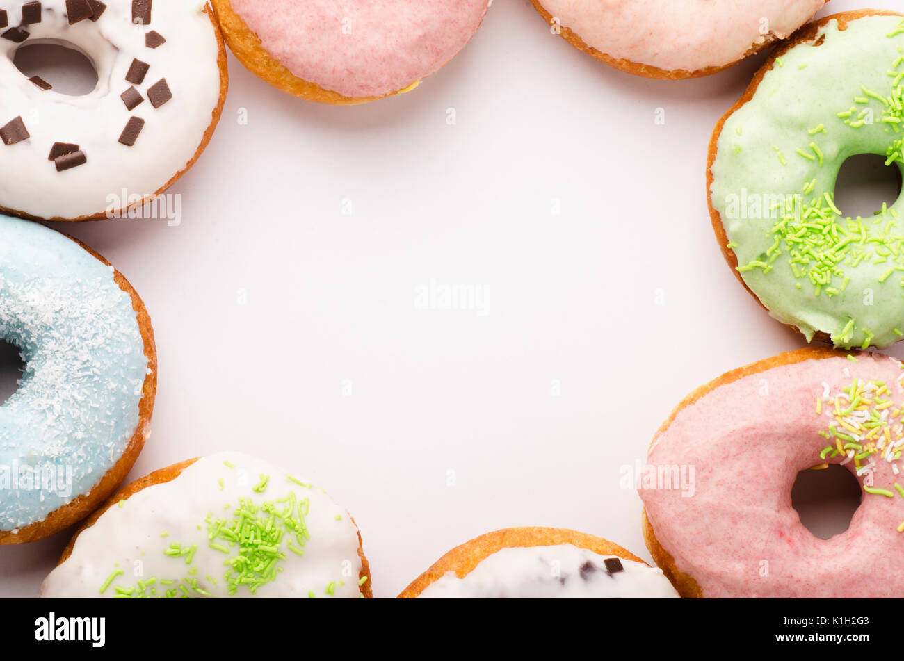 Circle of donuts isolated on white background and space for text Stock ...