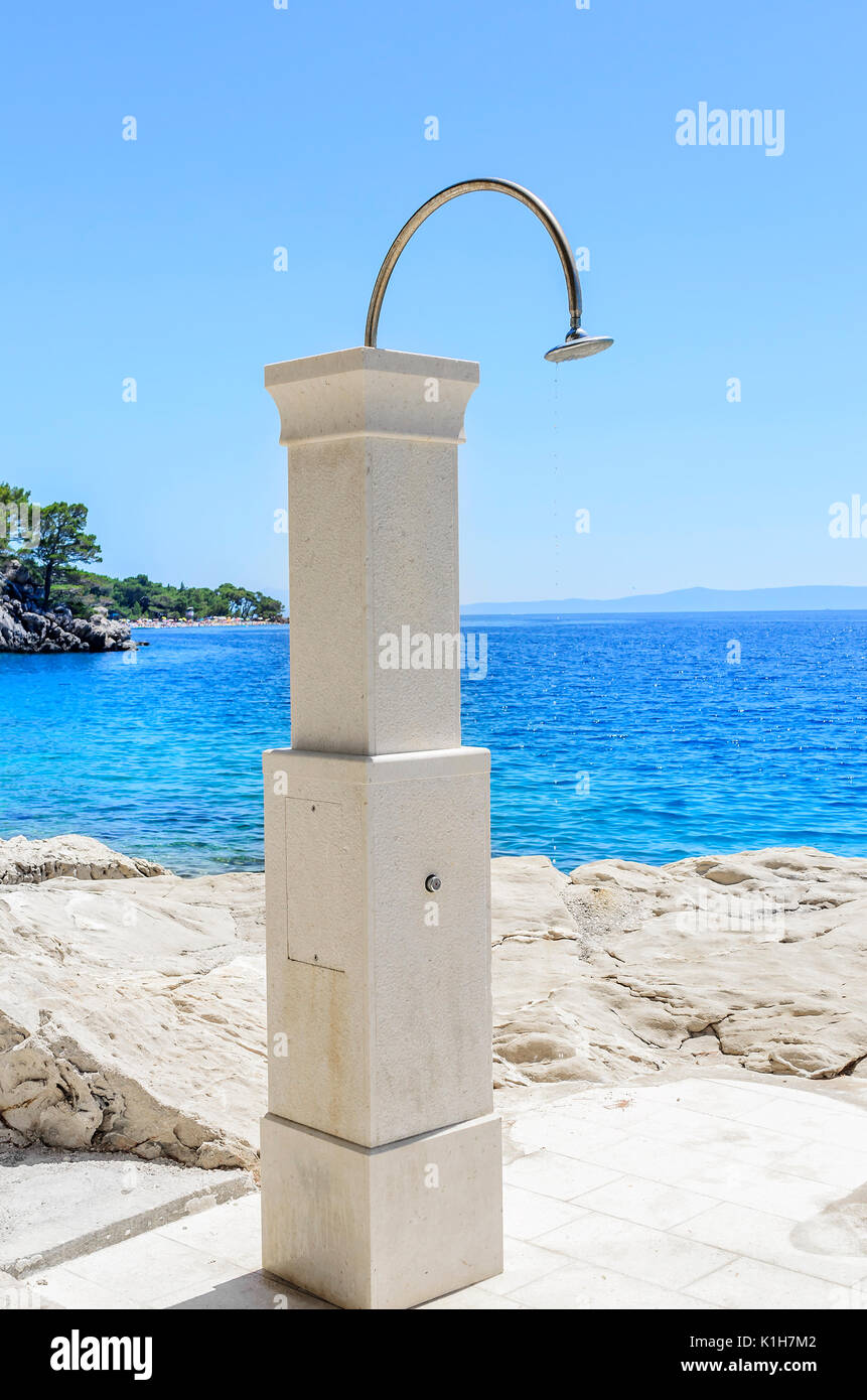 Beach outdoor shower on the background of the sea Stock Photo Alamy