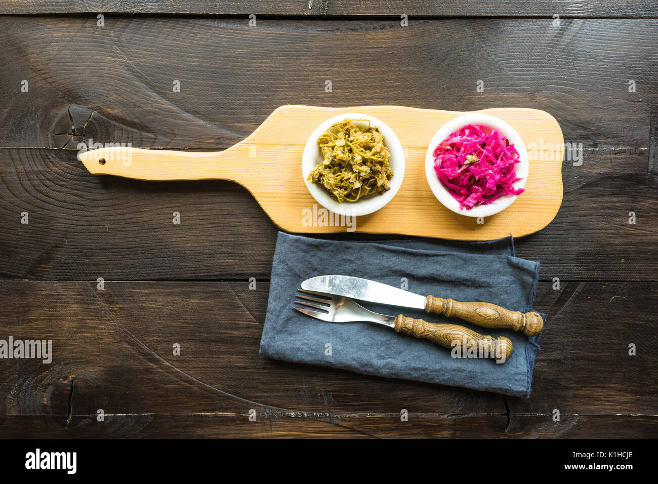 Traditional salads and ingredients as a hot chili pepper, sour red cabbage and jonjoli