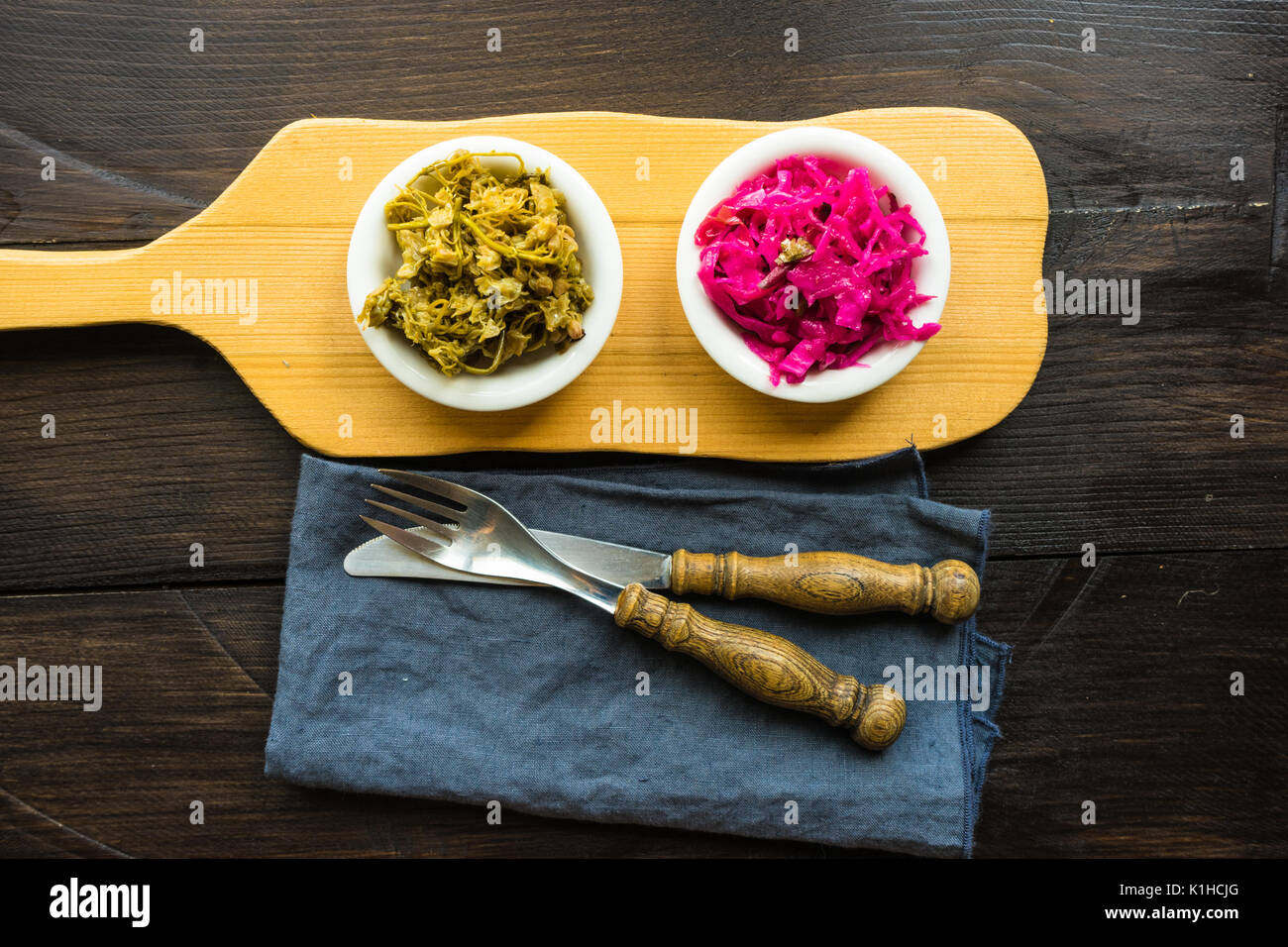 Traditional salads and ingredients as a hot chili pepper, sour red cabbage and jonjoli