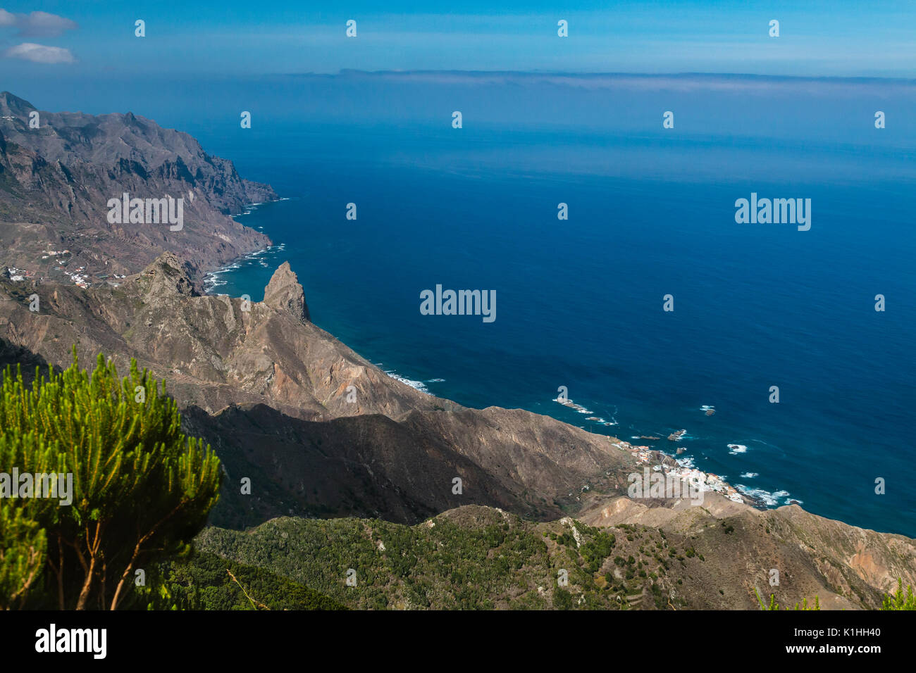 View from the Anaga mountains to Almaciga with the Roque de Enmedio to the left. Tenerife, Spain. Stock Photo