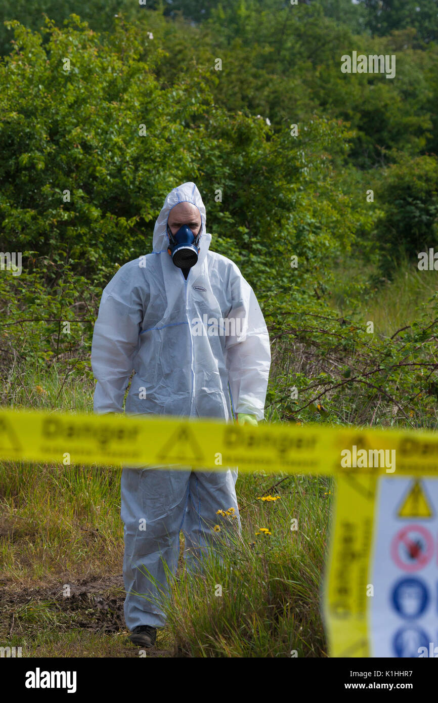 Ppe overalls hires stock photography and images Alamy
