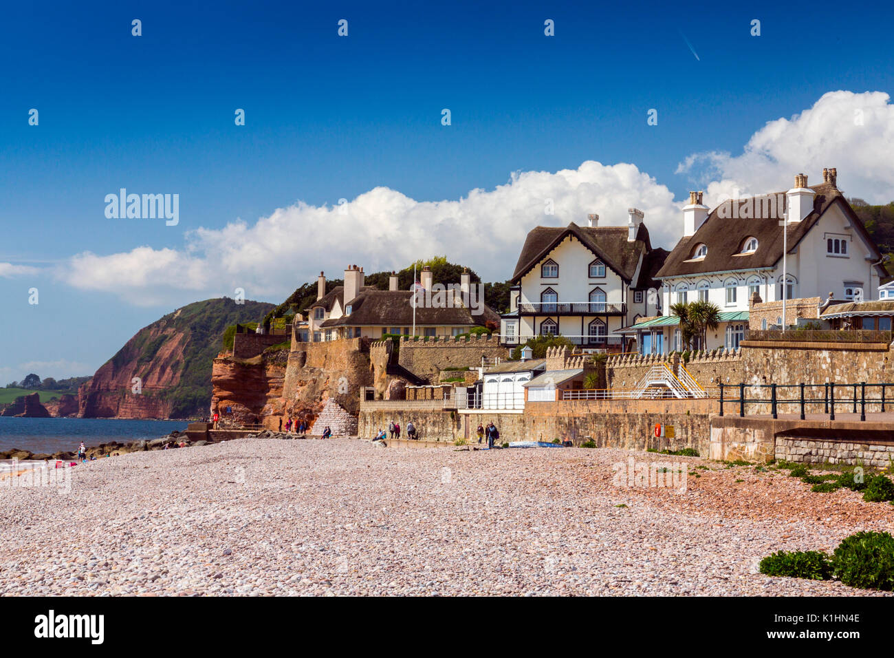 Sidmouth is a popular Victorian seaside resort on the Jurassic Coast with thatched houses and towering red sandstone cliffs, Devon, England, UK Stock Photo