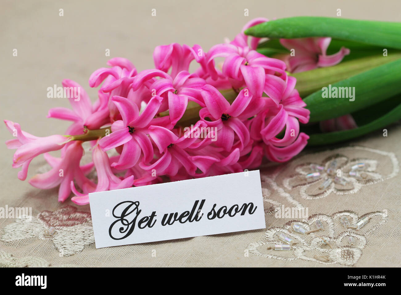 Get well soon with pink hyacinth flower Stock Photo