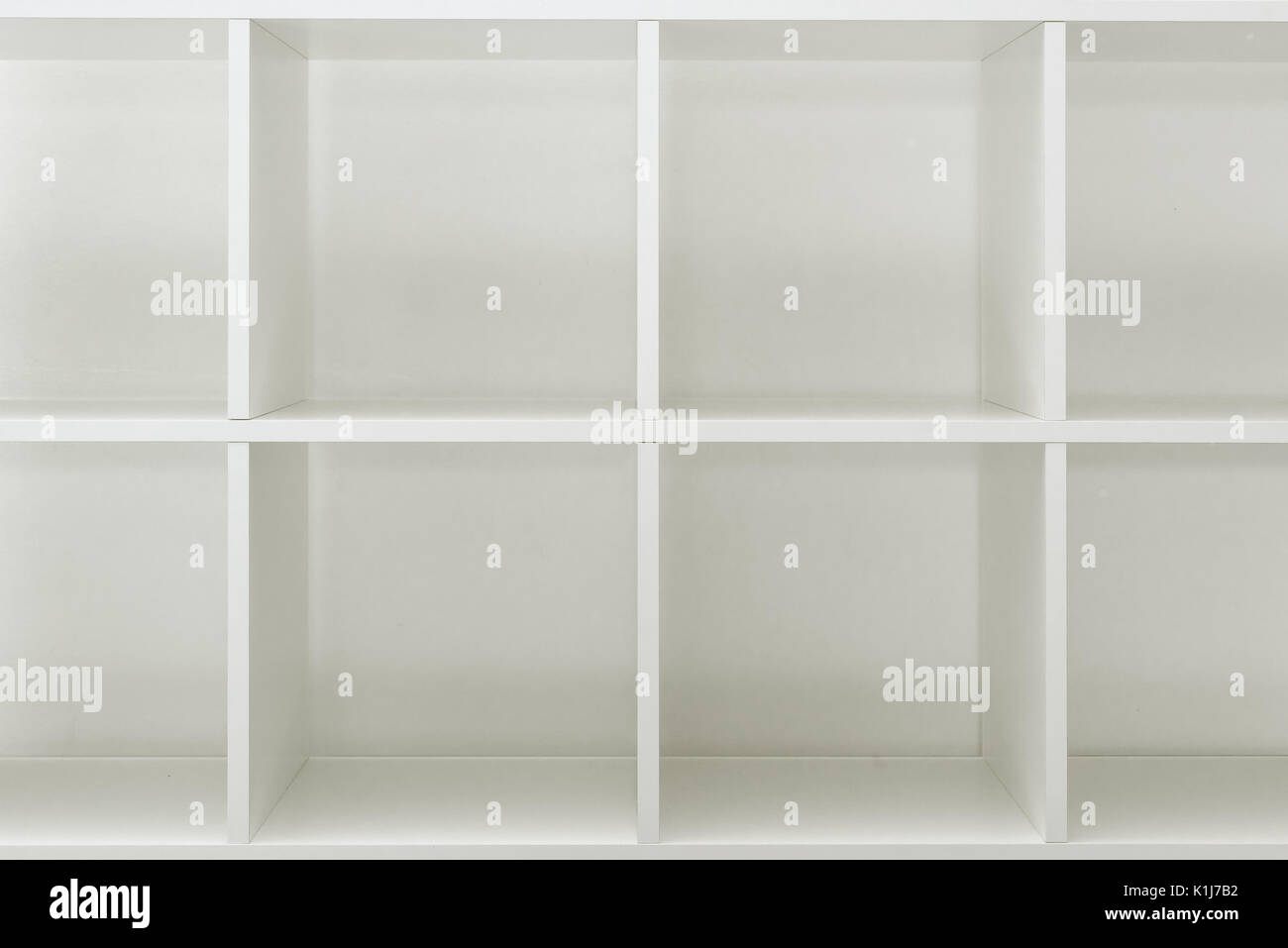 Empty office or bookcase library shelves with blank copy space for design mock up or product placement Stock Photo