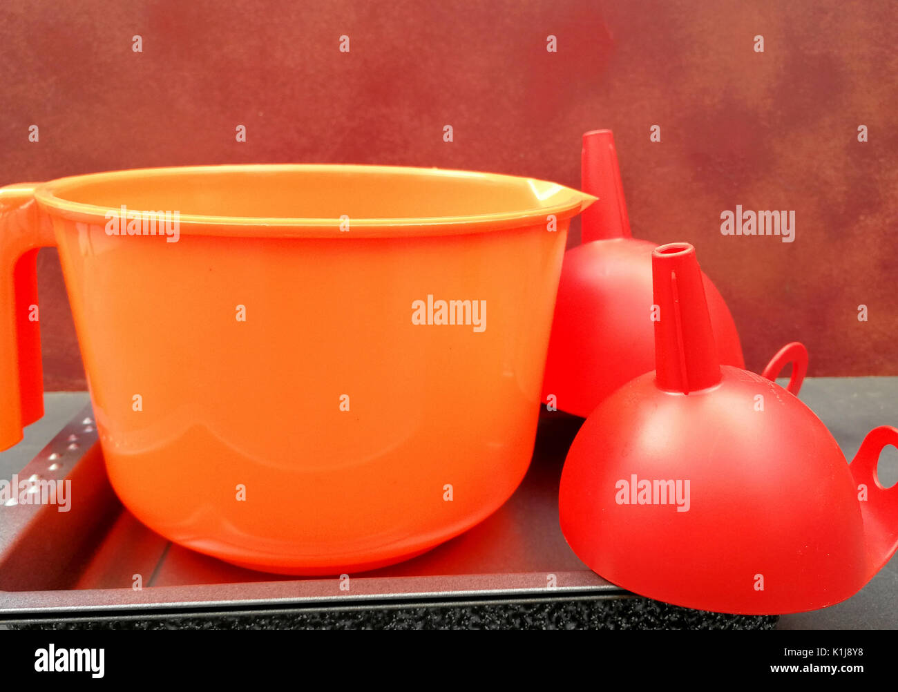 Jar and plastic funnels Stock Photo
