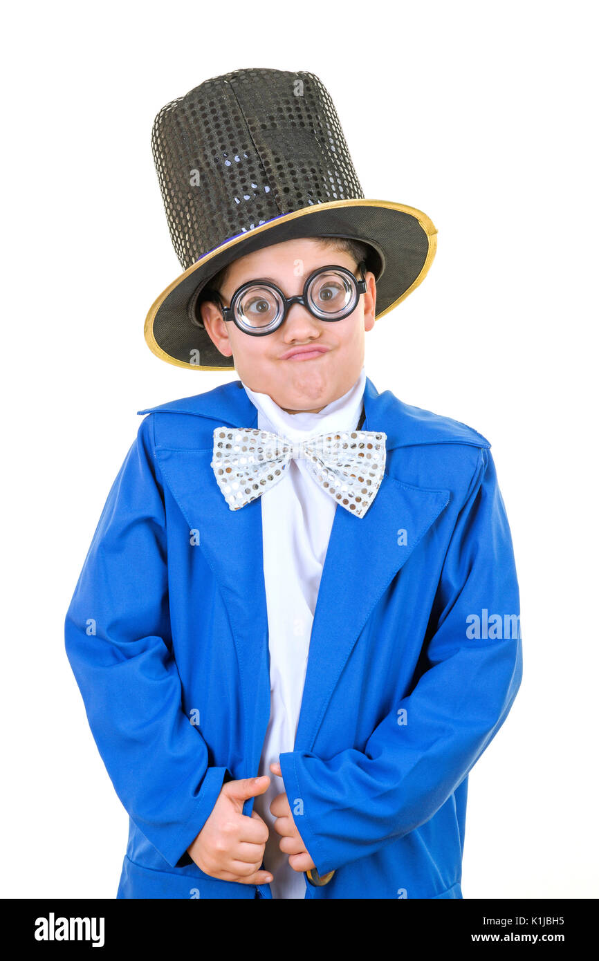 Portrait of a funny little boy in mad hatter costume while smiling to the camera against isolated white background. Stock Photo