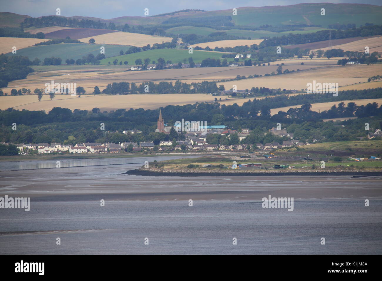 Distant view of Invergowrie across Tay Estuary Scotland August 2017 ...