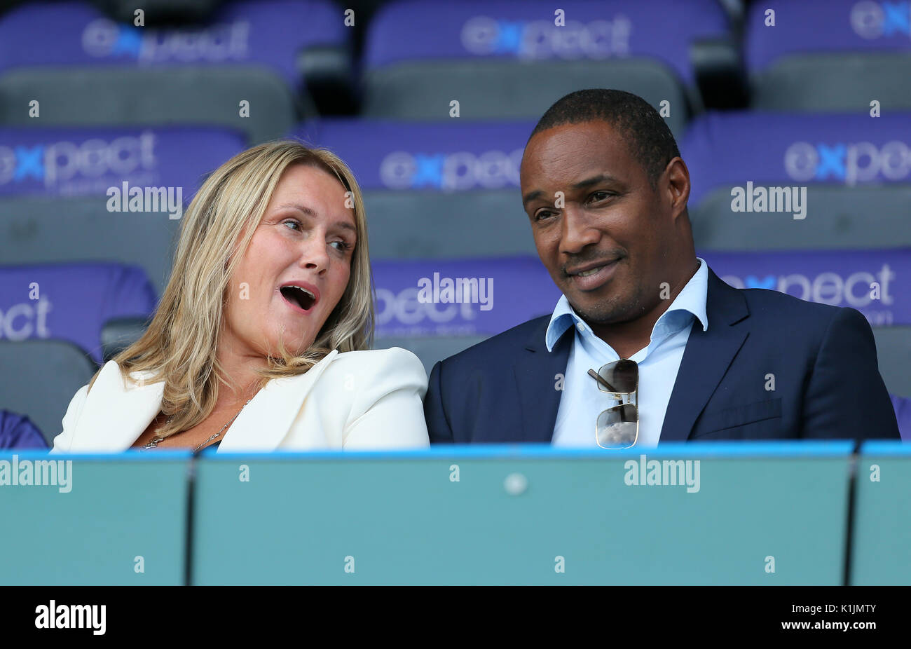 Paul Ince and wife Claire in the stands during the Premier League match at the John Smith's Stadium, Huddersfield. Stock Photo