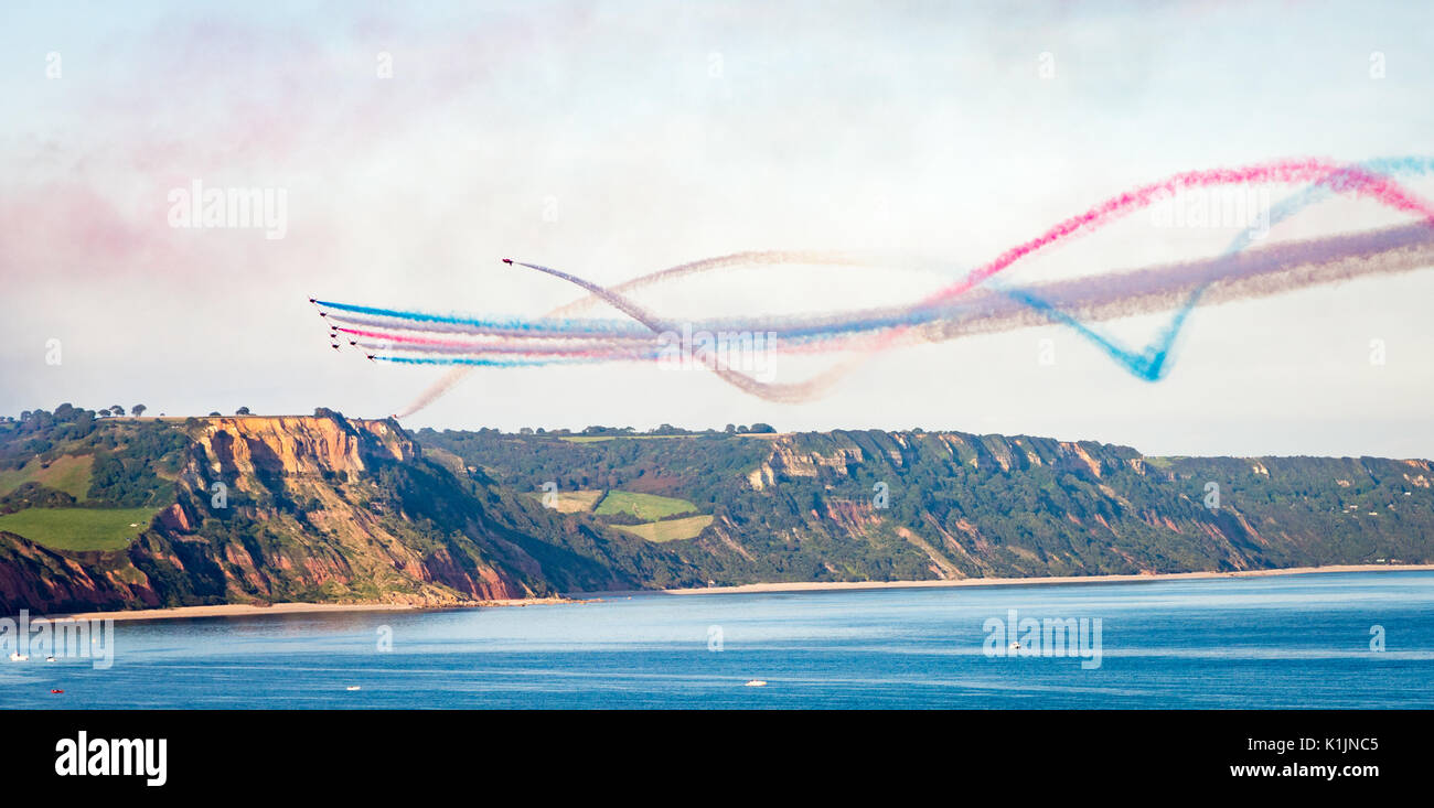 The Royal Air Force Red Arrows team perform in their BAE Hawk aircraft at their display in Sidmouth, England Stock Photo