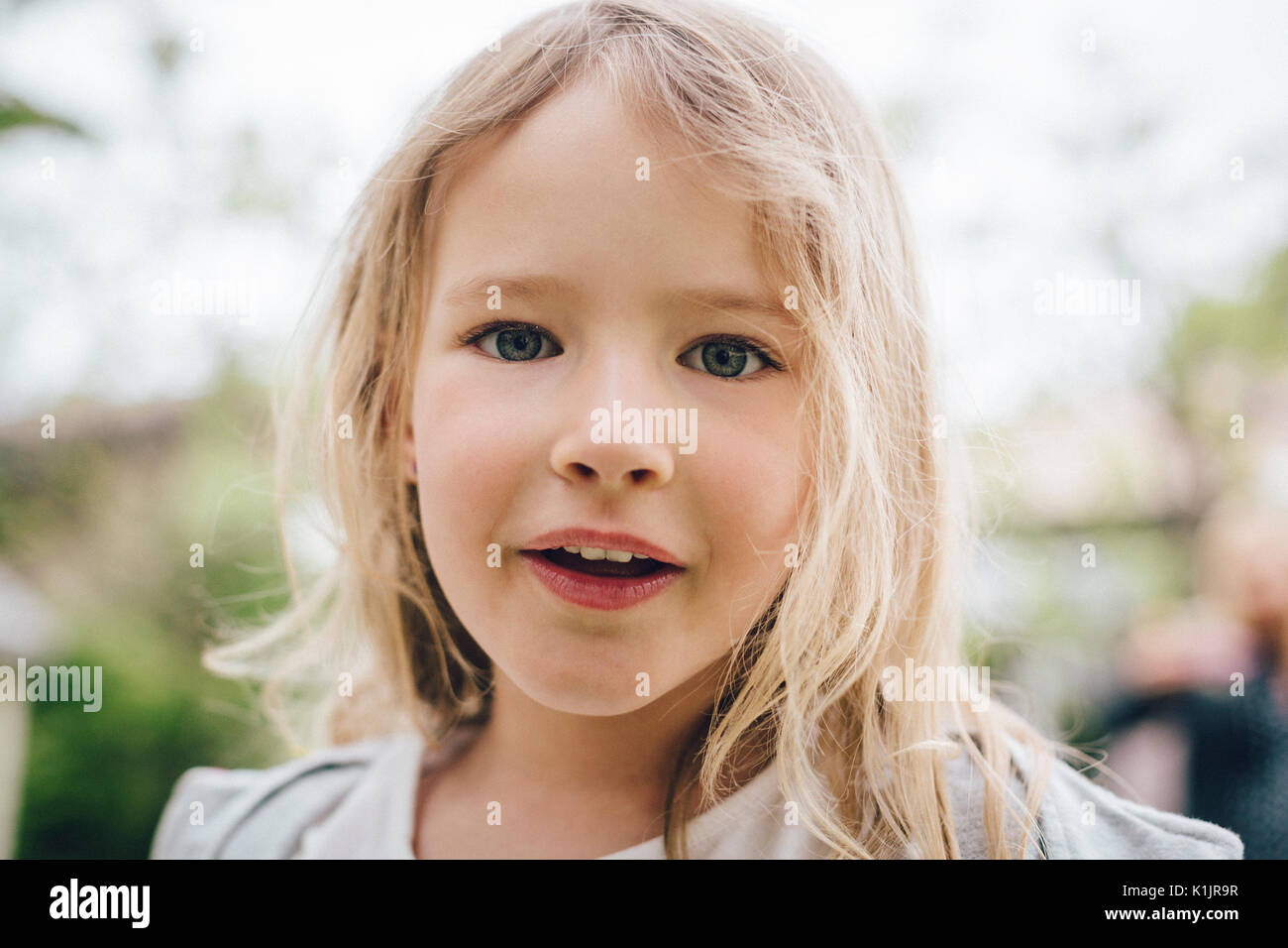 Portrait of a blond little girl Stock Photo - Alamy
