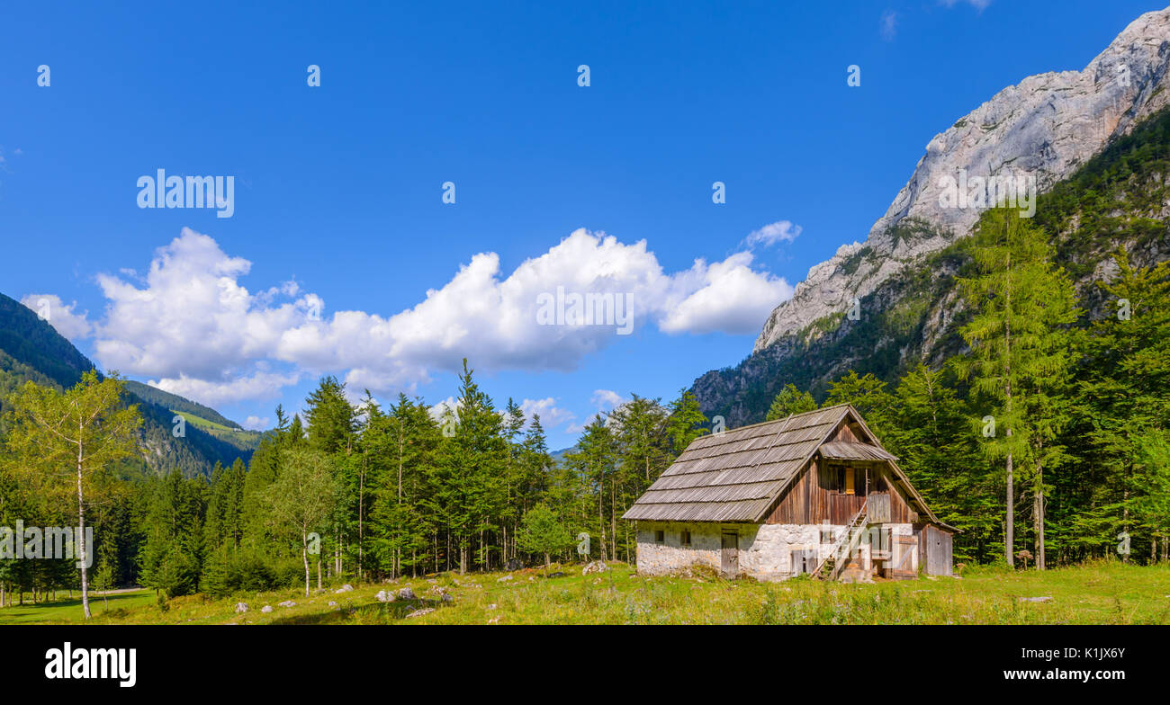 Mountain cabin, hut in European Alps, located in Robanov kot, Slovenia, popular hiking and climbing place with picturescue view Stock Photo