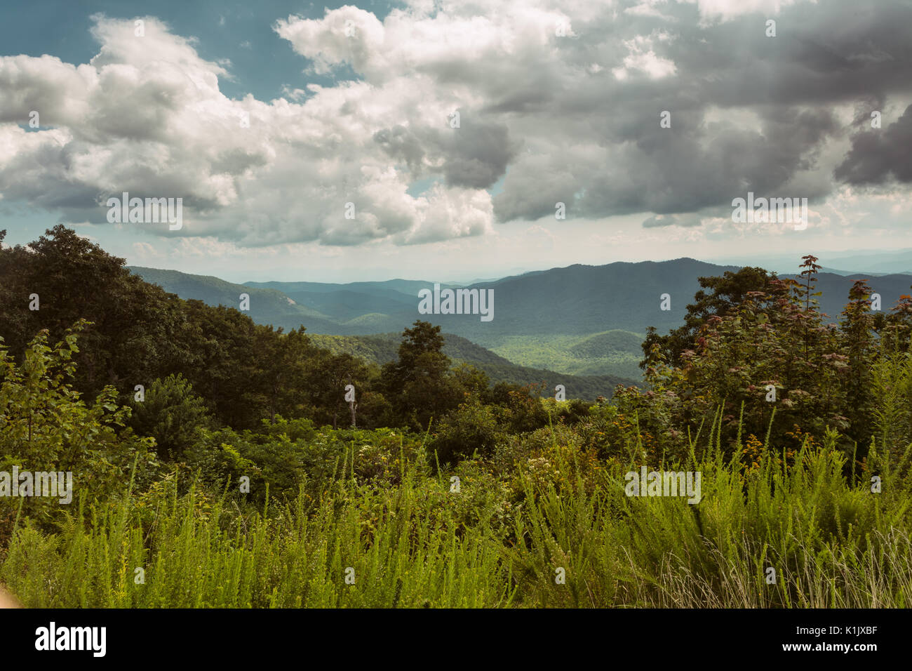 One of the many areas along the Blue Ridge Parkway where people can stop and gaze at the beautiful scenery of the Smokey Mountains. Stock Photo