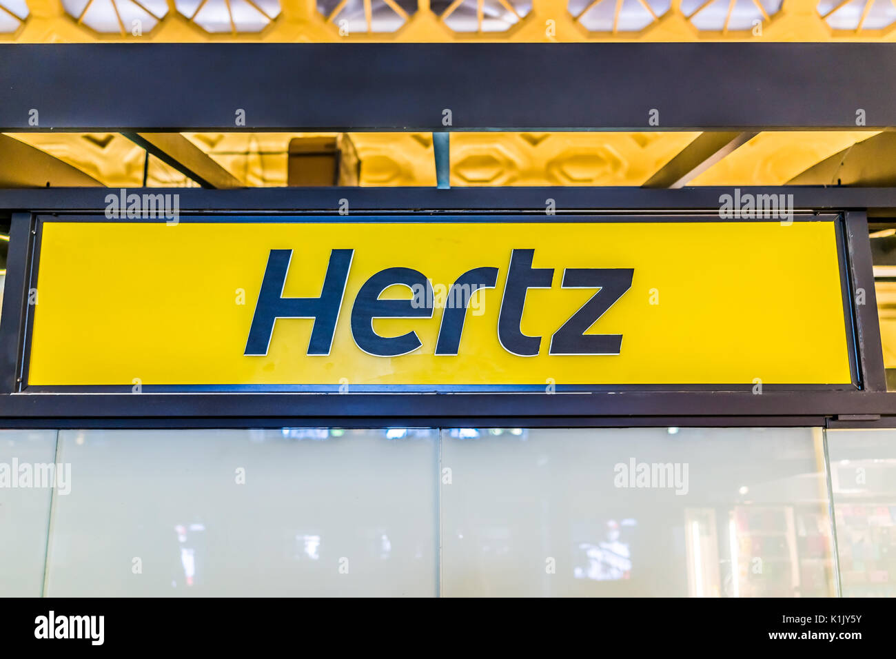 Washington DC, USA - July 1, 2017: Inside Union Station in capital city with car rental sign for Hertz Stock Photo