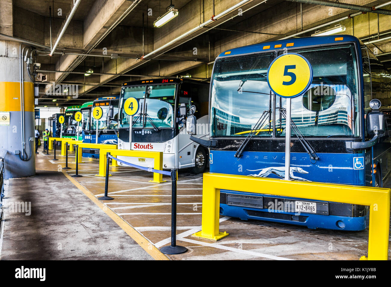 Washington DC, USA - July 1, 2017: Inside Union Station parking garage in capital city with row of buses Stock Photo