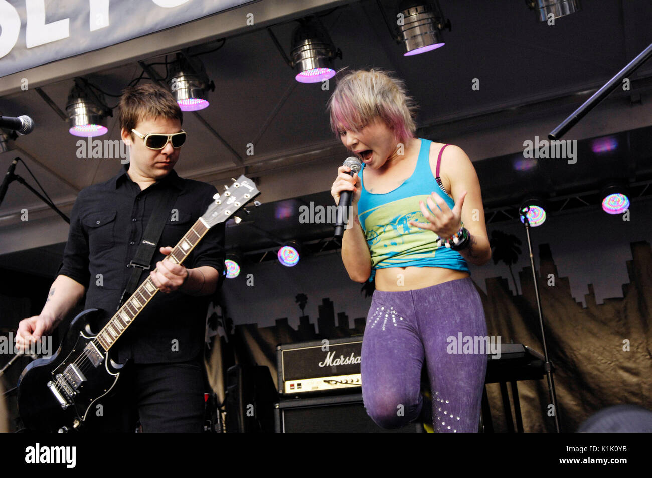 L-R) Chad Petree Sisely Treasure Shiny Toy Guns performs day L-R) Chad Petree Sisely Treasure Shiny Toy Guns performs day