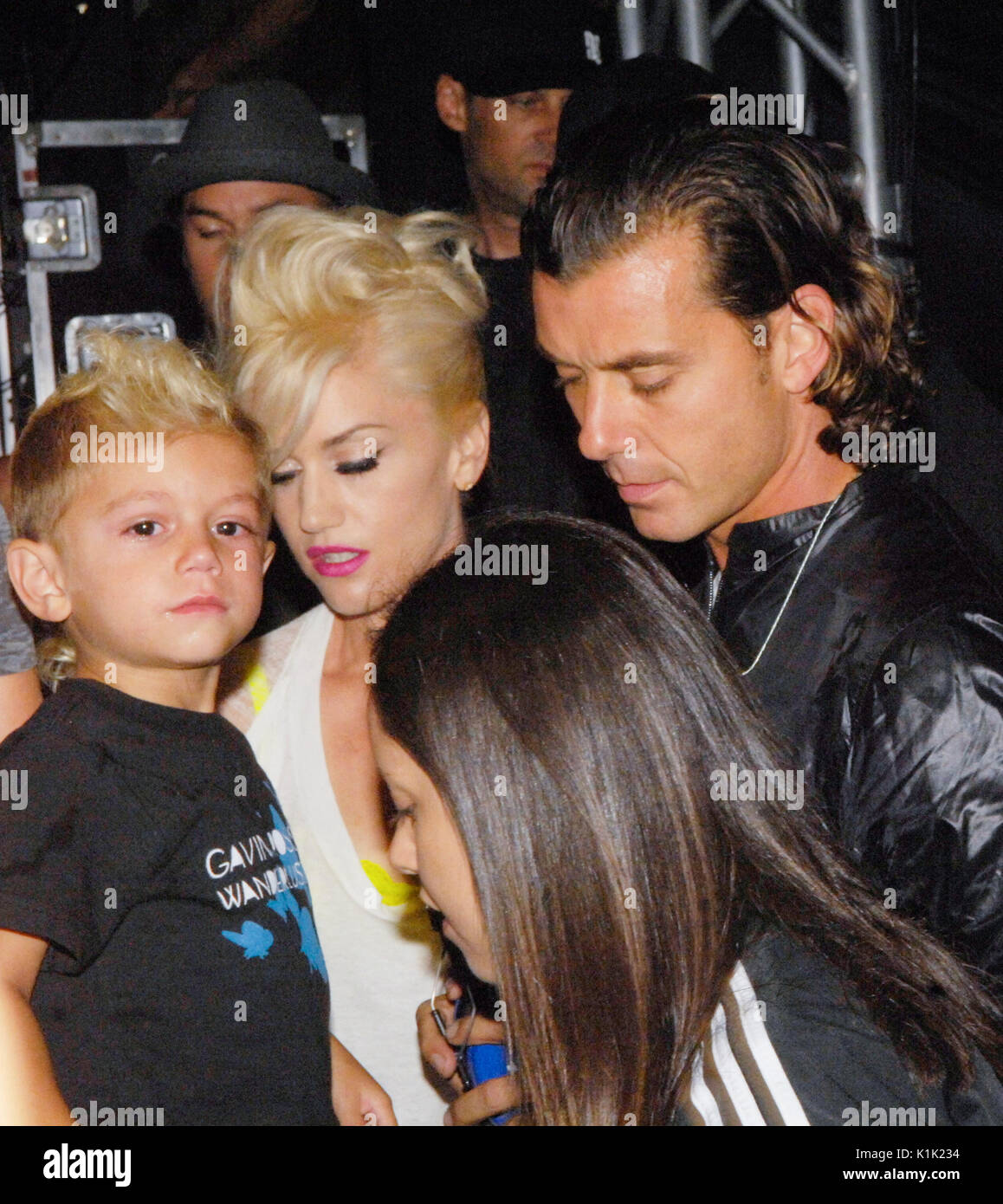 Gavin Rossdale of Bush with wife Gwen Stefani of No Doubt and their son Kingston Rossdale at the Grove in Los Angeles on August 26, 2009. Stock Photo