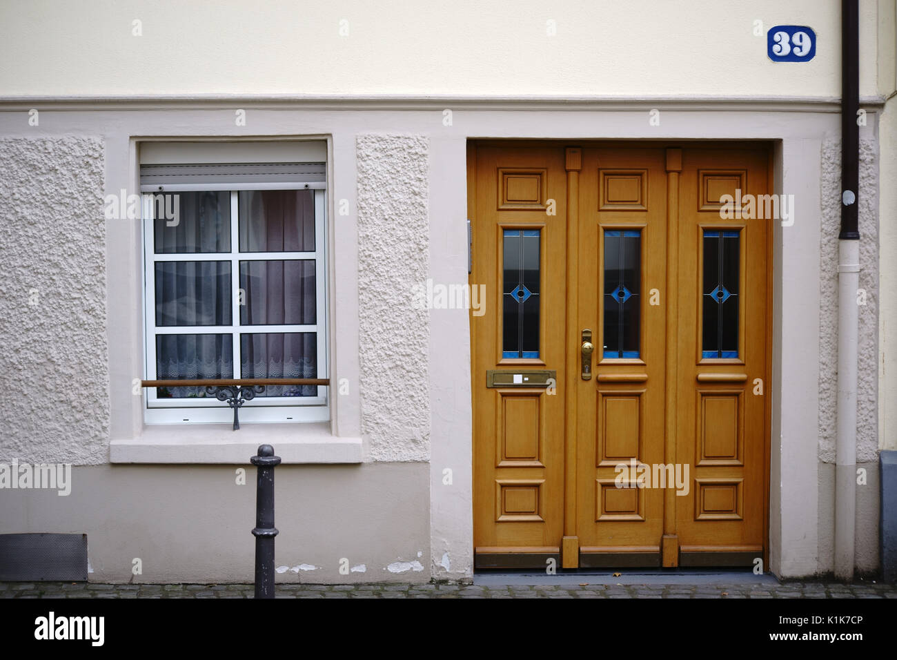 The House Entrance Of An Old Town House With Very Low