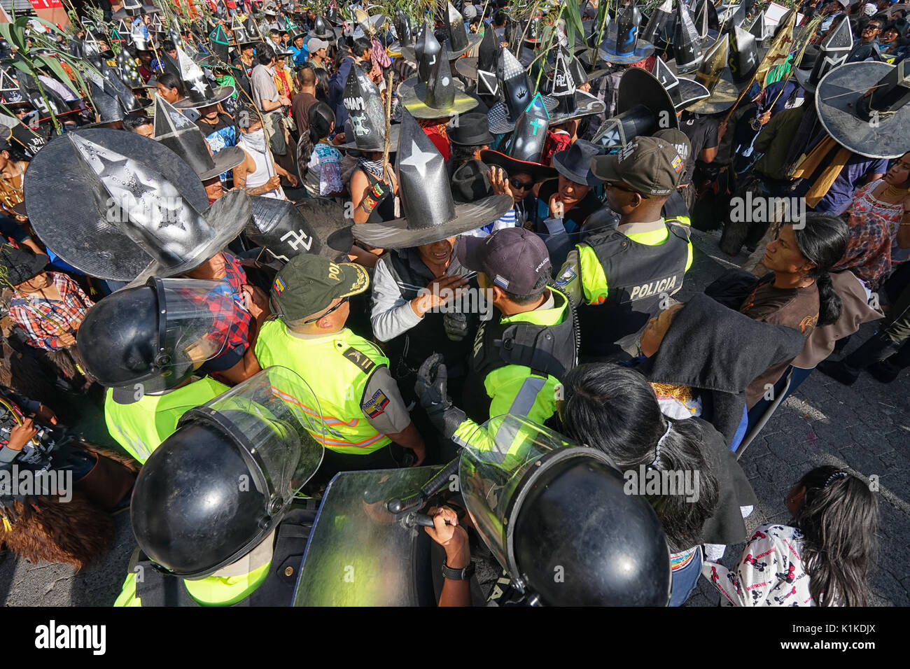 police at the Inti Raymi parade, which can turn violent sometimes in COtacachi Ecuador Stock Photo