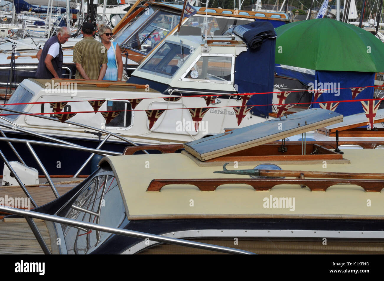 classic powerboats and motorboats at a festival at cowes on the isle of wight swordsman and swordfish fairey marine Southampton vessels for pleasure Stock Photo