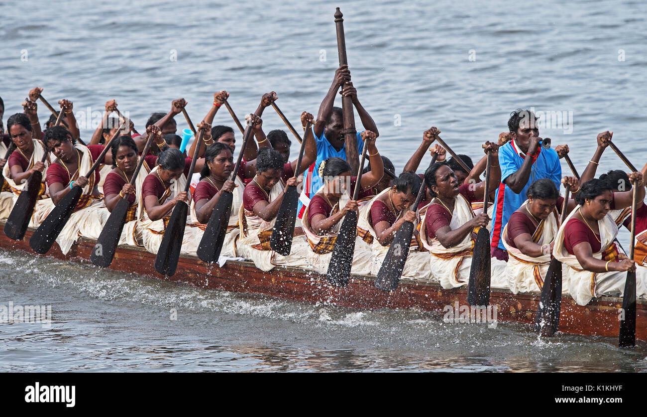 The image of women rowing Snake boat in Nehru boat race day, Allaepy, Punnamda Lake, Kerala India Stock Photo