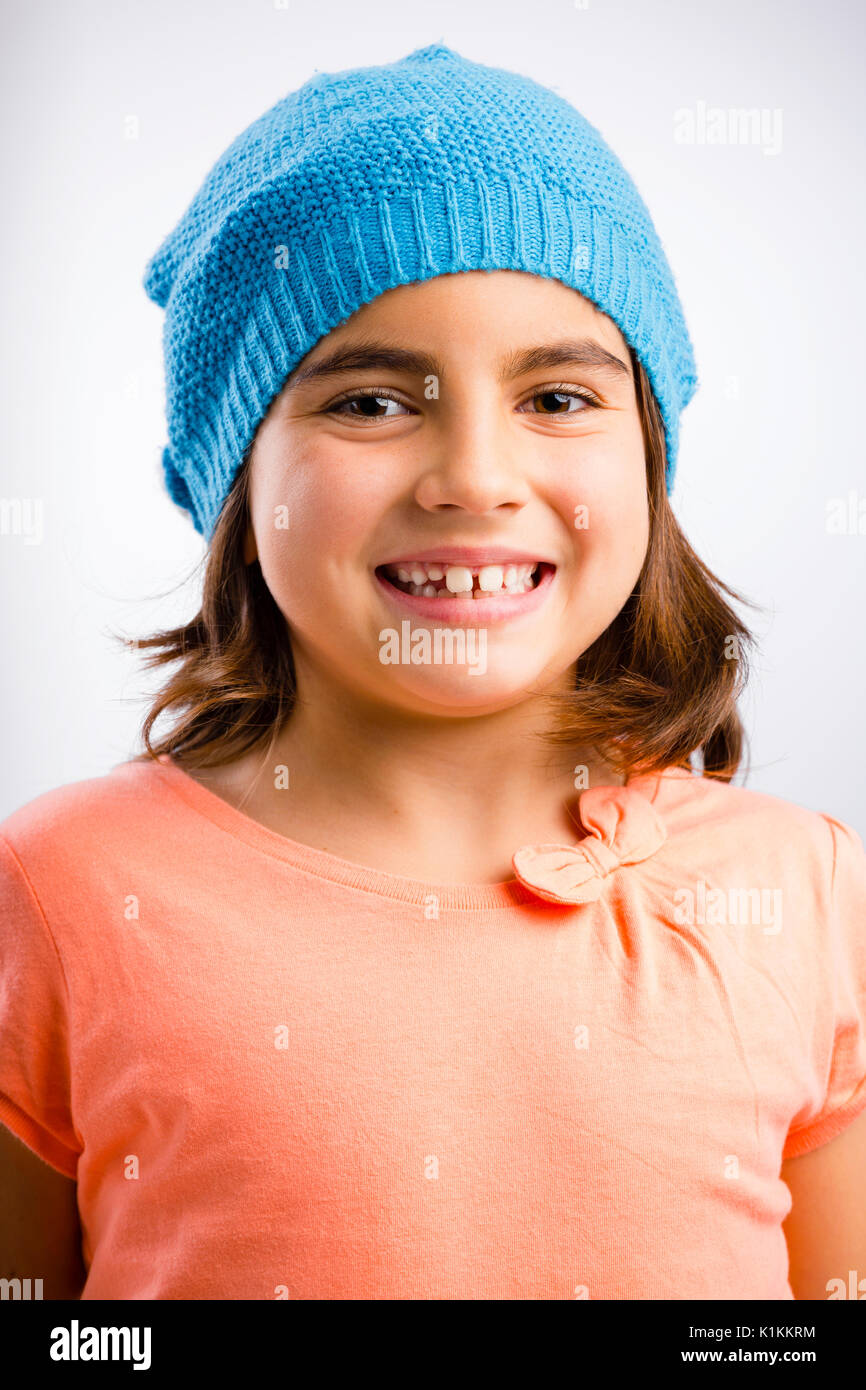 Studio portrait of a beautiful happy girl smilling Stock Photo - Alamy
